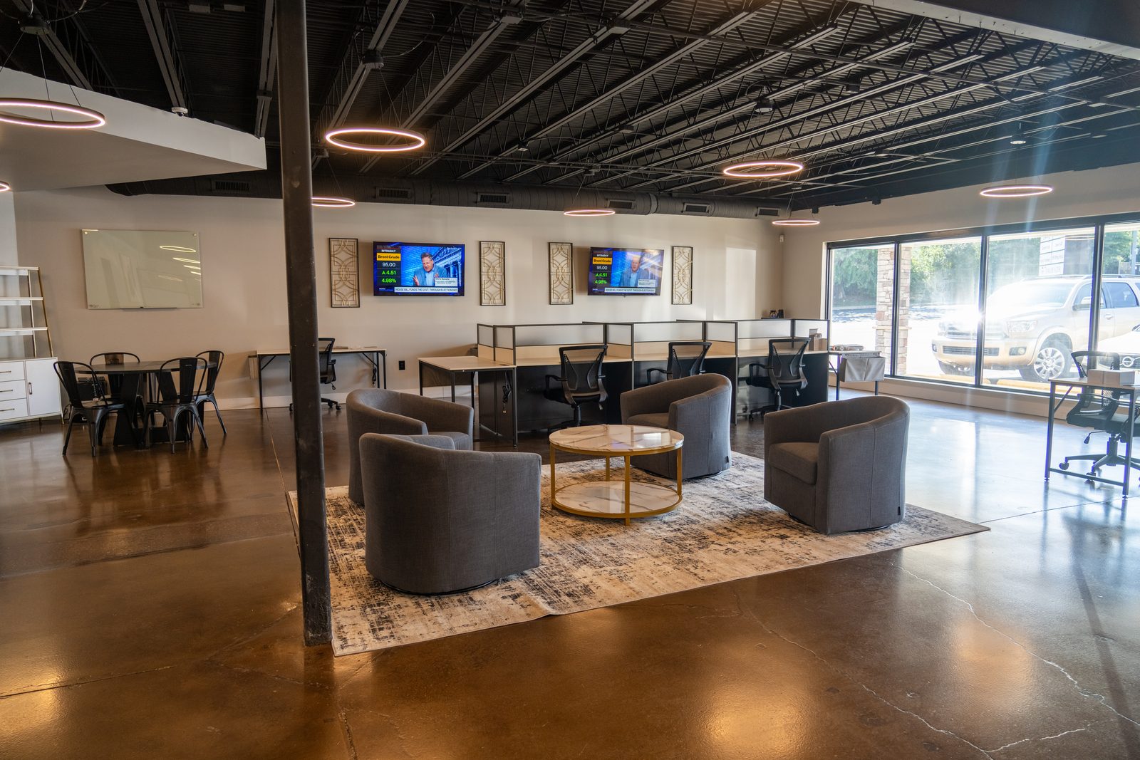 The first-floor lounge at Trailblazer Brokerage; GEMS meets upstairs